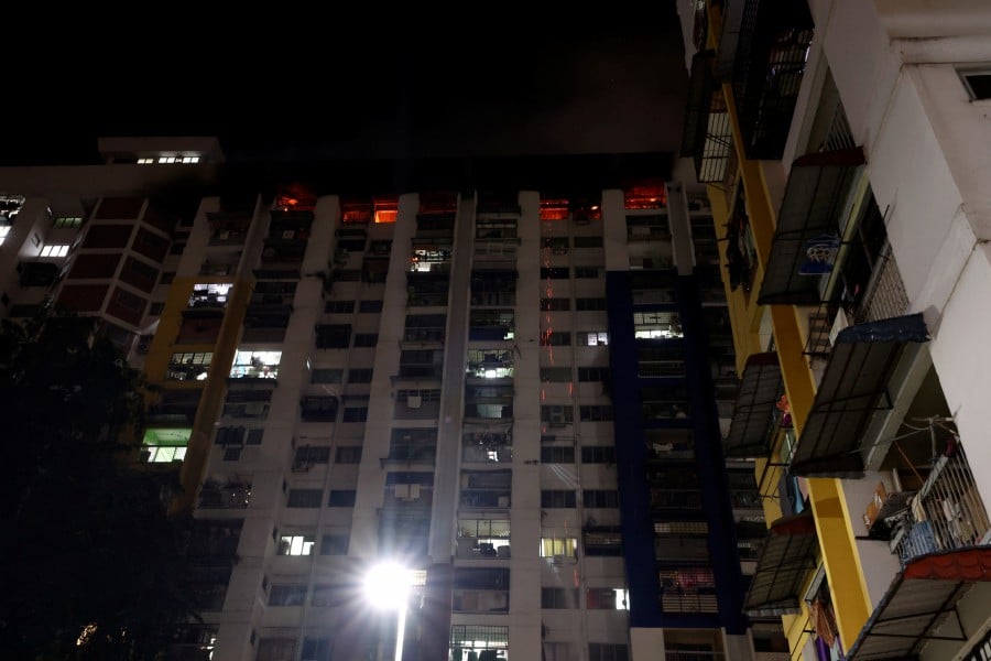 Six homes on the 17th floor of Block 70 of the Sri Sabah flats in Cheras were razed in the fire. - BERNAMA PIC
