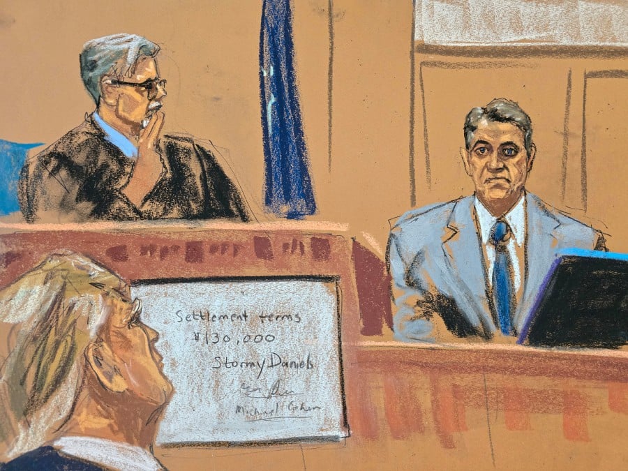 Former U.S. President Donald Trump watches as lawyer Keith Davidson, who represented former Playboy model Karen McDougal, is questioned during Trump's criminal trial before Justice Juan Merchan in Manhattan state court in New York City in this courtroom sketch. - REUTERS PIC