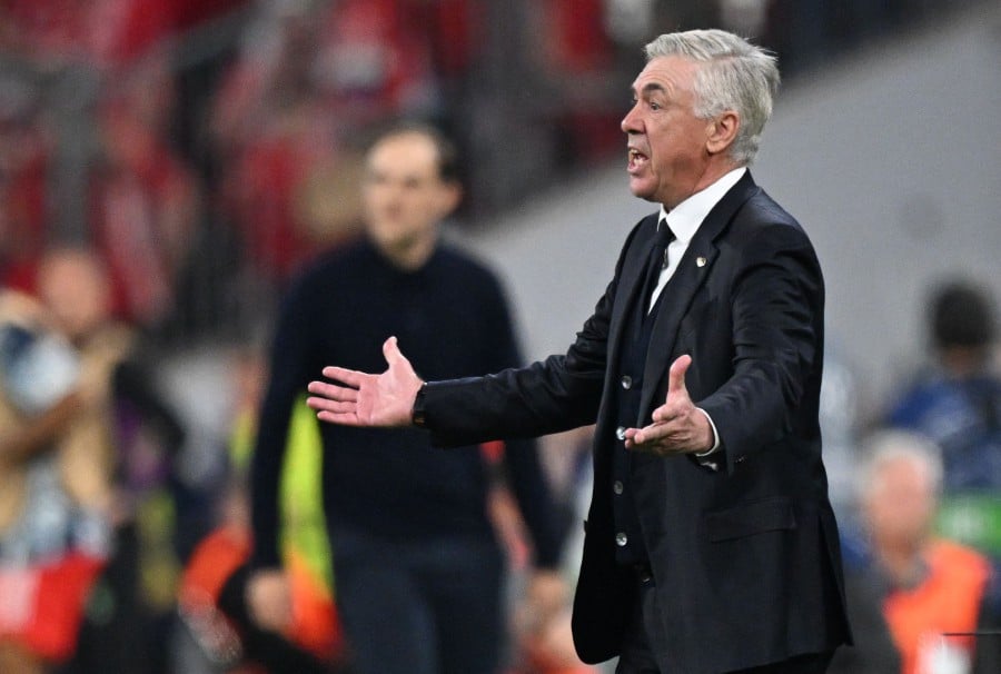Real Madrid's Italian coach Carlo Ancelotti reacts during the UEFA Champions League semi-final first leg football match against Bayern Munich in Munich. - AFP PIC