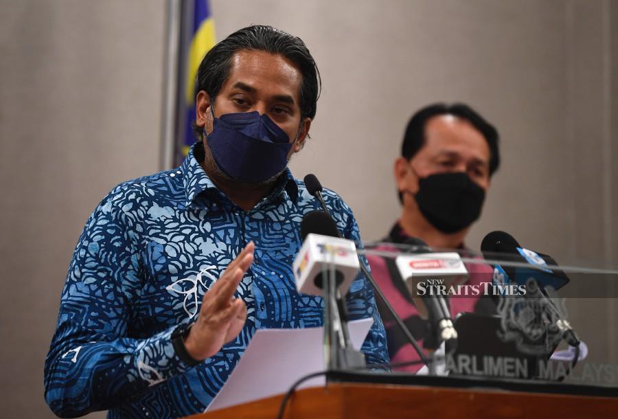 Health Minister Khairy Jamaludin addresses the media at the Parliament today. Also present is Health director-general Tan Sri Dr Noor Hisham Abdullah. - BERNAMA PIC