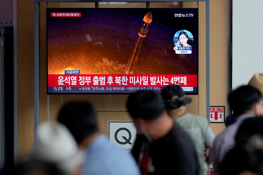 A TV screen showing a news programme reporting about North Korea's missile launch with file image, is seen at the Seoul Railway Station in Seoul, South Korea. - AP PIC