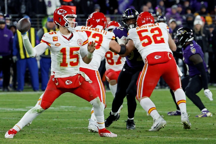Kansas City Chiefs quarterback Patrick Mahomes (15) passes the ball against the Baltimore Ravens during the fourth quarter in the AFC Championship football game at M&T Bank Stadium. - REUTERS PIC