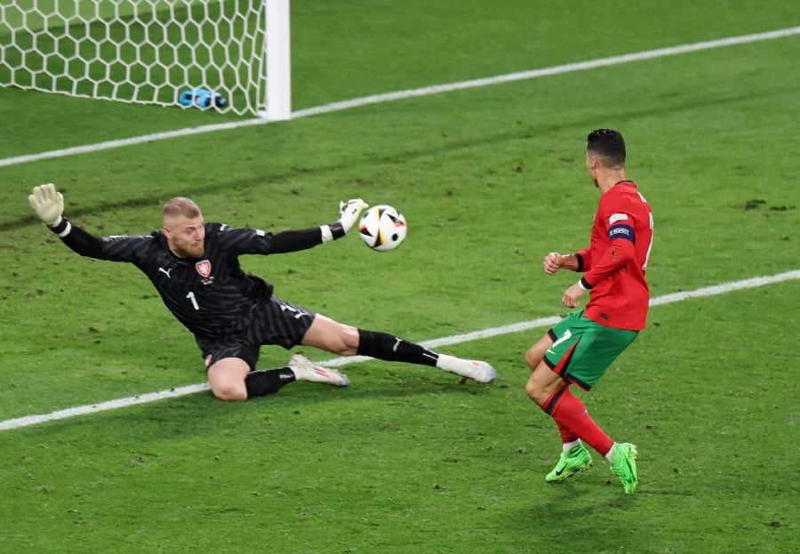  Portugal's Cristiano Ronaldo has his shot saved by Czech Republic's Jindrich Stanek during their Euro 2024 Group F match at the Leipzig Stadium in Leipzig, Germany on Tuesday (June 18). — REUTERS