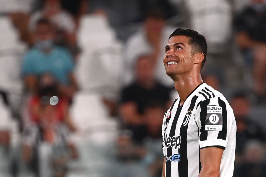 Cristiano RONALDO (Juve) dressing up the jersey Football Champions