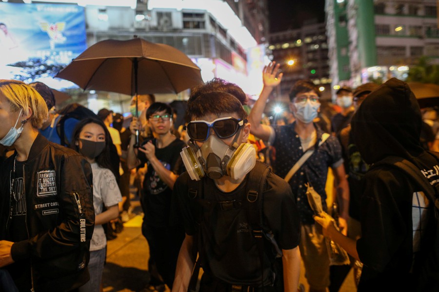 Protesters attend a rally against police's violence at Mong Kok, in Hong Kong. - EPA