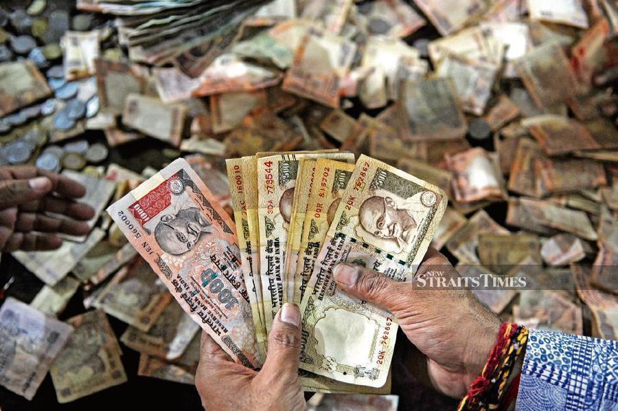 Trade between Indian and Malaysian businesses can now be conducted using the Indian Rupee (INR). - File pic
