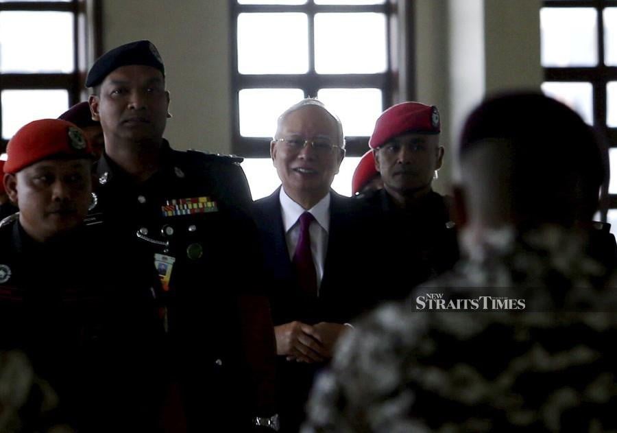 Datuk Seri Najib Razak seen arriving at the Kuala Lumpur Courts Complex ahead of his 1MDB trial. -NSTP/EIZAIRI SHAMSUDIN