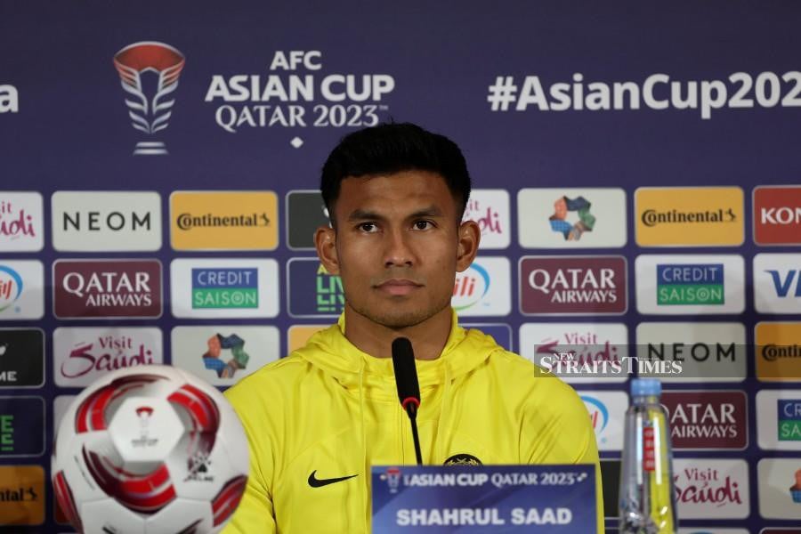 Harimau Malaya’s Shahrul Saad speaking to reporters during a press conference in Doha. -NSTP/HAIRUL ANUAR RAHIM.