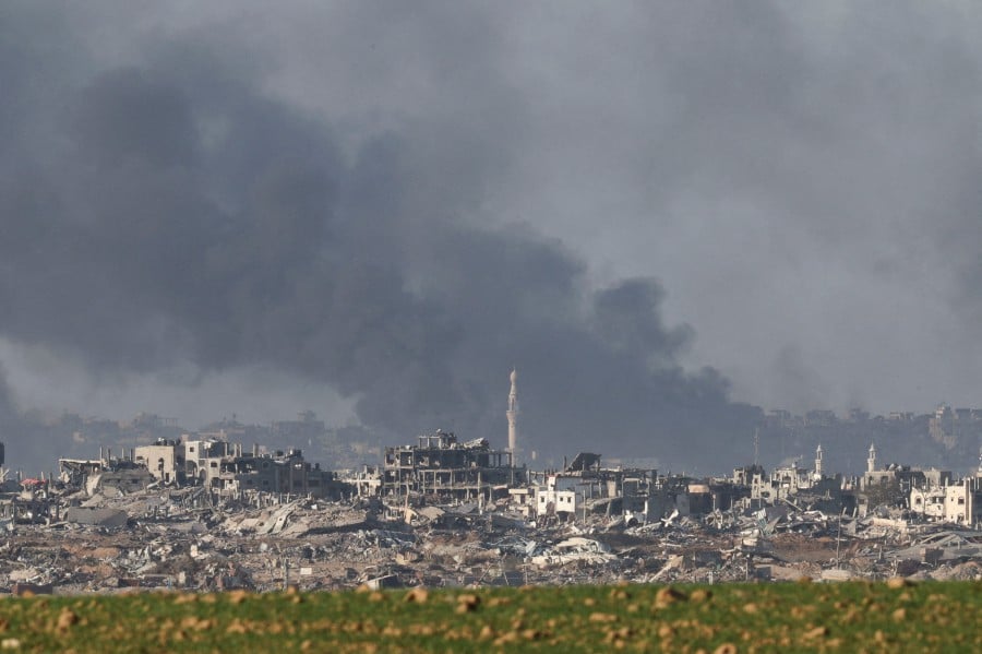 Smoke rises over Gaza, amid the ongoing conflict between Israel and the Palestinian Islamist group Hamas, as seen from southern Israel.- REUTERS PIC