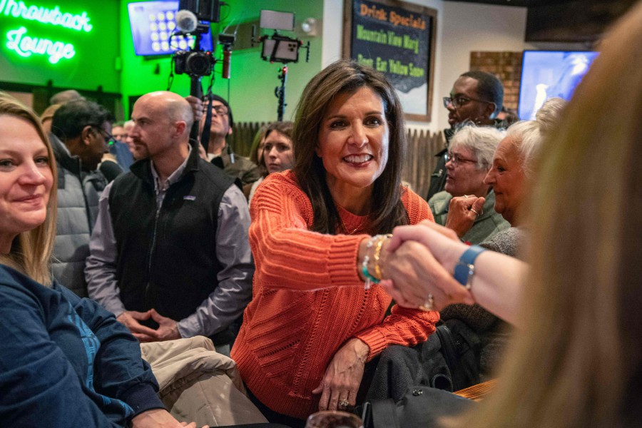 Republican presidential hopeful and former UN Ambassador Nikki Haley greets voters at a campaign event at the Backyard Brewery in Manchester, New Hampshire. - AFP PIC