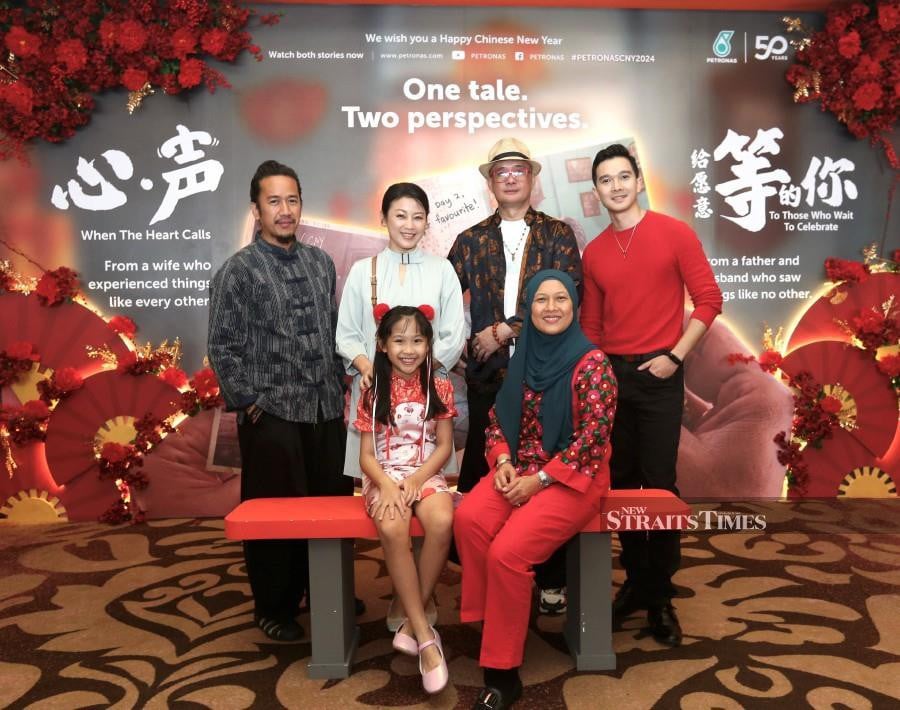 Petronas Senior general manager of strategic communications Siti Azlina Abdul Latif (seated right) with the cast at the launch of the webfilms in Petaling Jaya. - NSTP/AMIRUDIN SAHIB.