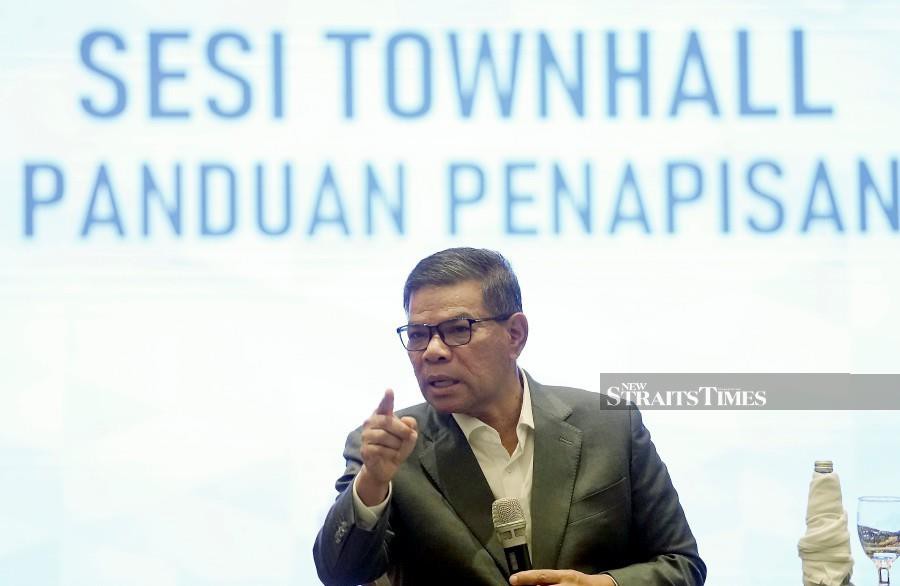 Home Minister Datuk Seri Saifuddin Nasution Ismail answering questions after launching the new Film Censorship Guidelines in Putrajaya. -NSTP/MOHD FADLI HAMZAH