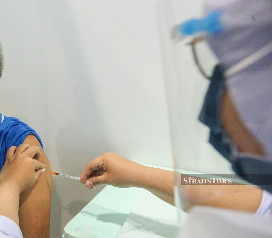Senior Education Minister Datuk Dr Radzi Jidin says students who will sit for major examinations will be given priority for the Covid-19 vaccination. -NSTP/FARIZ ISWADI ISMAIL.