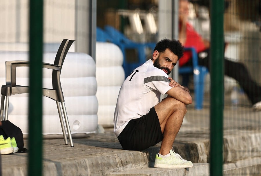 Egypt's forward #10 Mohamed Salah looks on as his teammates train during a training session at Jardin Botanique stadium in Bingerville, Abidjan on January 21, 2024 on the eve of the Africa Cup of Nations (CAN) 2024 football match between Egypt and Cape Verde.- AFP pic