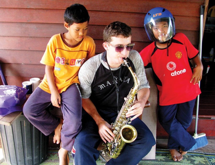 Owen Cortner with SK Cherok Paloh students