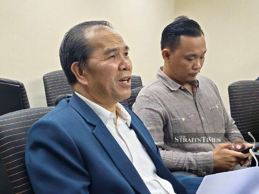 Sabah PKR Kota Marudu division chief Sazalye Donol during a press conference.-NSTP/ Olivia Miwil.