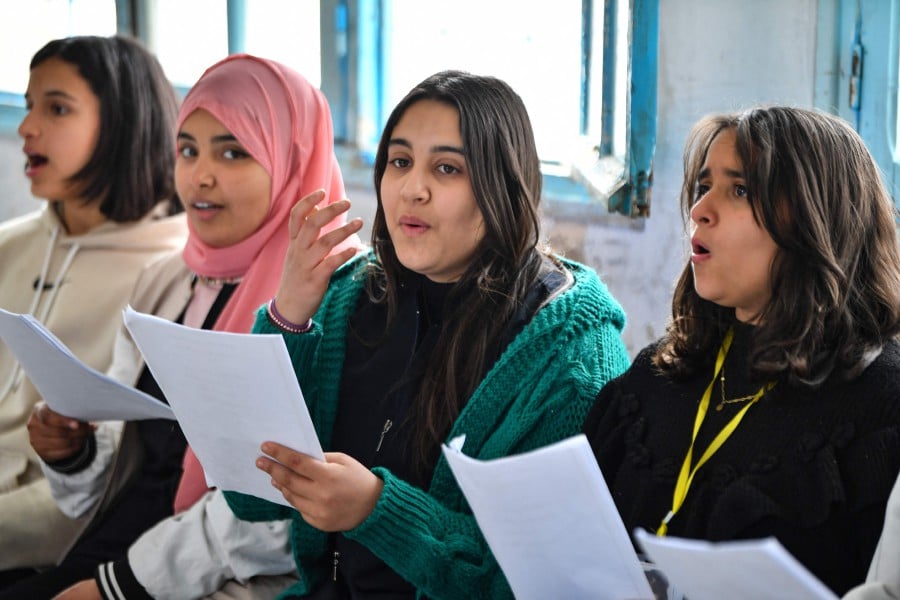 Students attend a music class financed by the after-school club Tunisia 88, at the Haffouz secondary school in Tunisia's northern Kairouan region on February 2, 2024. -- AFP