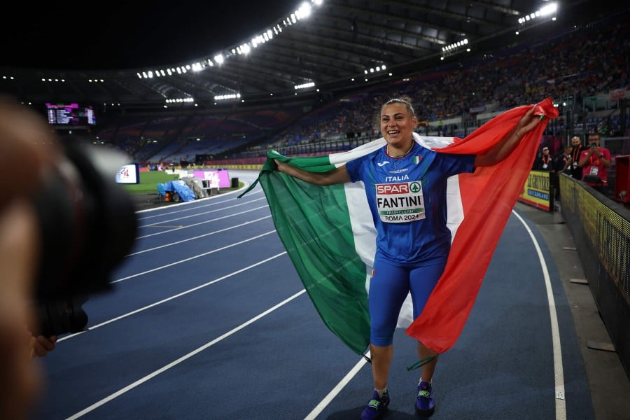 Italy's Sara Fantini celebrates winning the women's hammer throw final during the European Athletics Championships at the Olympic stadium in Rome on June 10, 2024. -- AFP