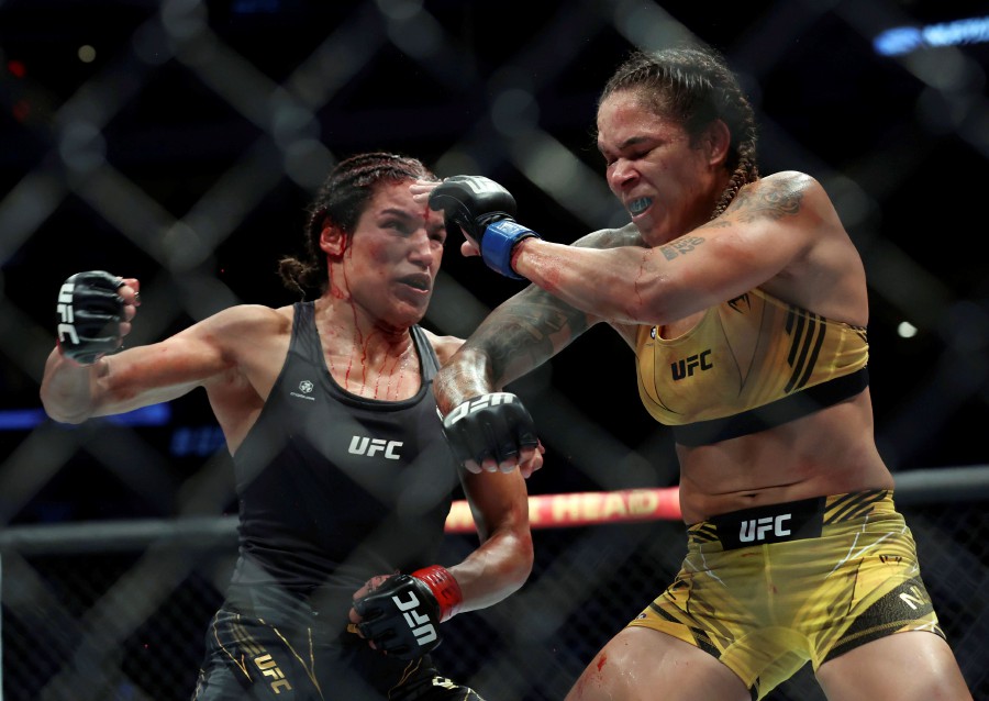 Julianna Pena, left, faces Amanda Nunes in a mixed martial arts women's bantamweight title bout at UFC 277. - AP PIC
