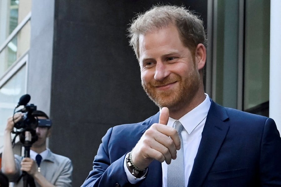 FILE PHOTO: Britain's Prince Harry, Duke of Sussex, gestures as he departs the Rolls Building of the High Court in London, Britain June 7, 2023. -- REUTERS/File Photo