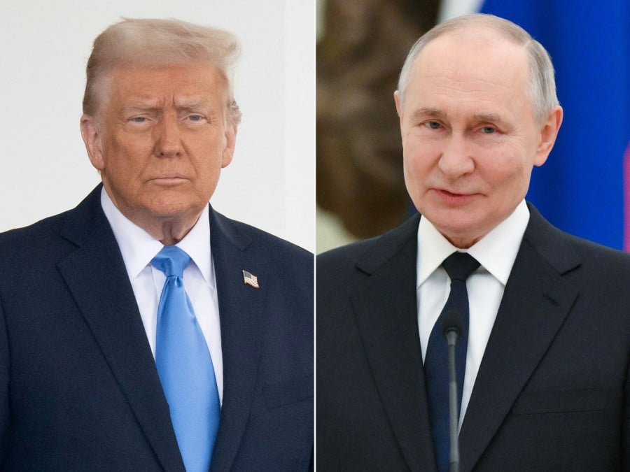 US President Donald Trump and Russia's President Vladimir Putin. -- AFP FILEPIC