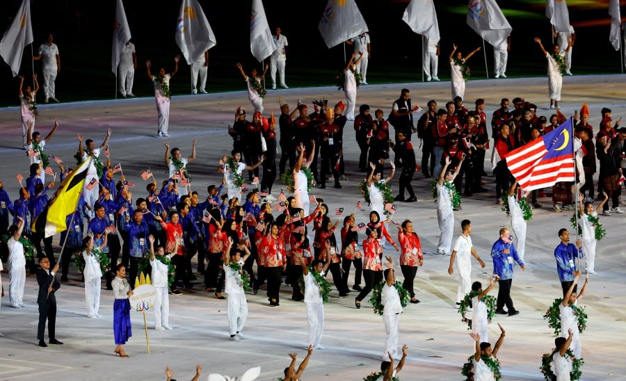 Malaysia'S contingents during the parade of nations at the opening ceremony. - REUTERS Pic