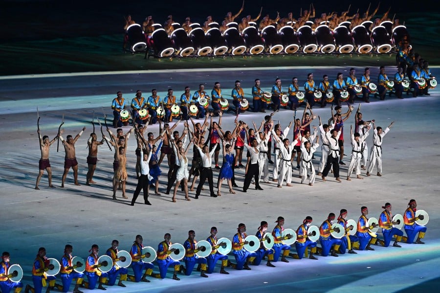 Performers take part in the opening ceremony of the 32nd Southeast Asian Games (SEA Games) at the Morodok Techo National Stadium in Phnom Penh. - AFP PIC