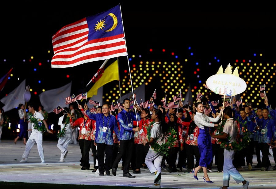 Malaysia's contingent during the parade of nations at the opening ceremony. - REUTERS PIC