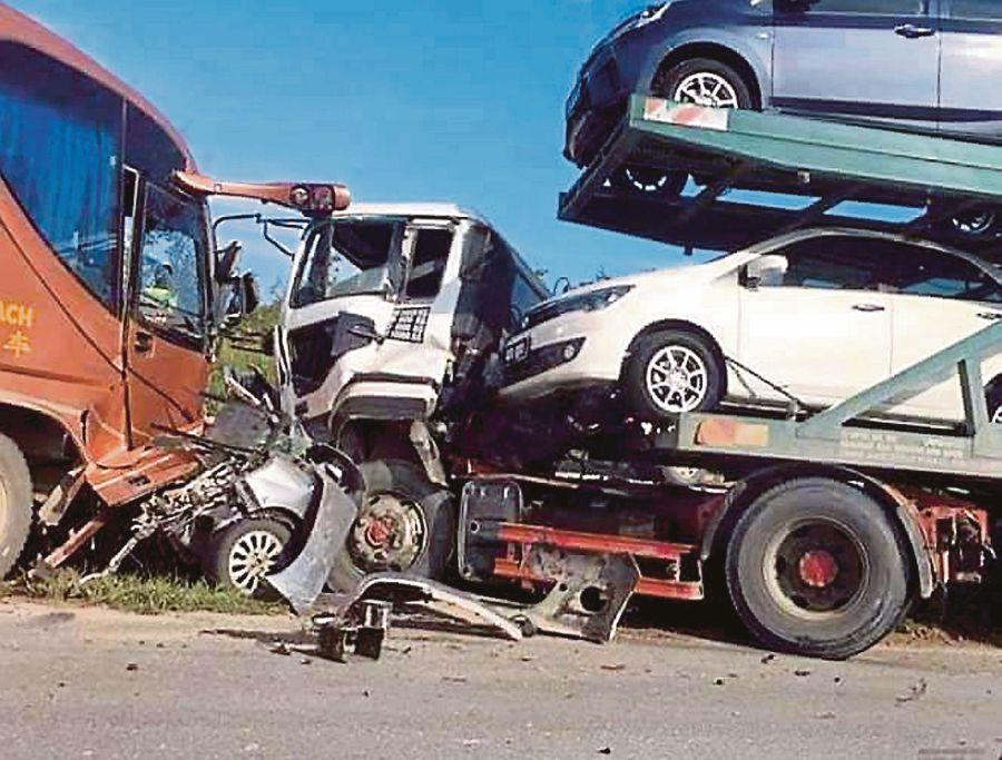 Five people including two children were killed in an accident involving two cars, a pick-up truck, a trailer and an express bus at Jalan Oya-Sibu near the Stapang police station here today.