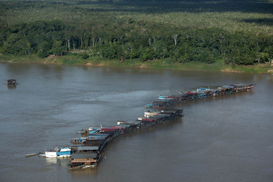  This handout file photo taken on November 23, 2021 released by Greenpeace shows accommodations and mining structures on the Madeira River, near the Rosarinho community, in Autazes, Amazonas state, Brazil. - AFP PIC