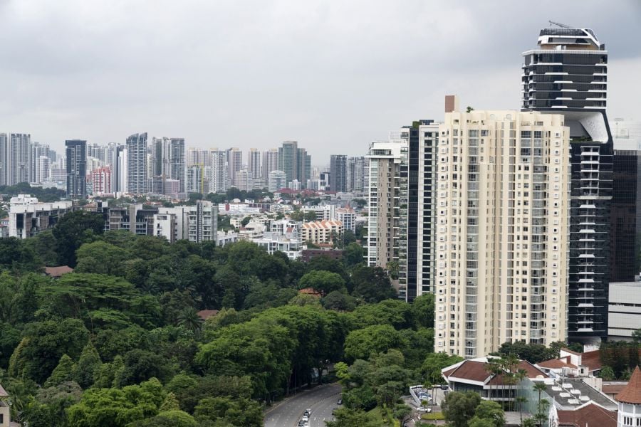 Condominiums stand on Scotts Road across from heritage houses in the wooded area of Goodwood Hill in Singapore, on Saturday, May 8, 2021. As the coronavirus pandemic hammers Southeast Asia and political turmoil threatens Hong Kong, Singapore has become a safe harbor for some of the region's wealthiest tycoons and their families. A spike in virus cases may pause some of the rich migration to Singapore, but it’s likely to be short-lived. Bloomberg Photo (Photographer: Wei Leng Tay)
