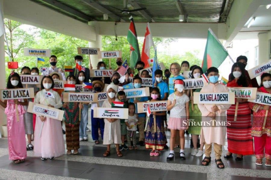 Students representing various nations posing for a group photo at Austin Heights Private and International School in Johor Baru. - Pic by VINCENT D’SILVA