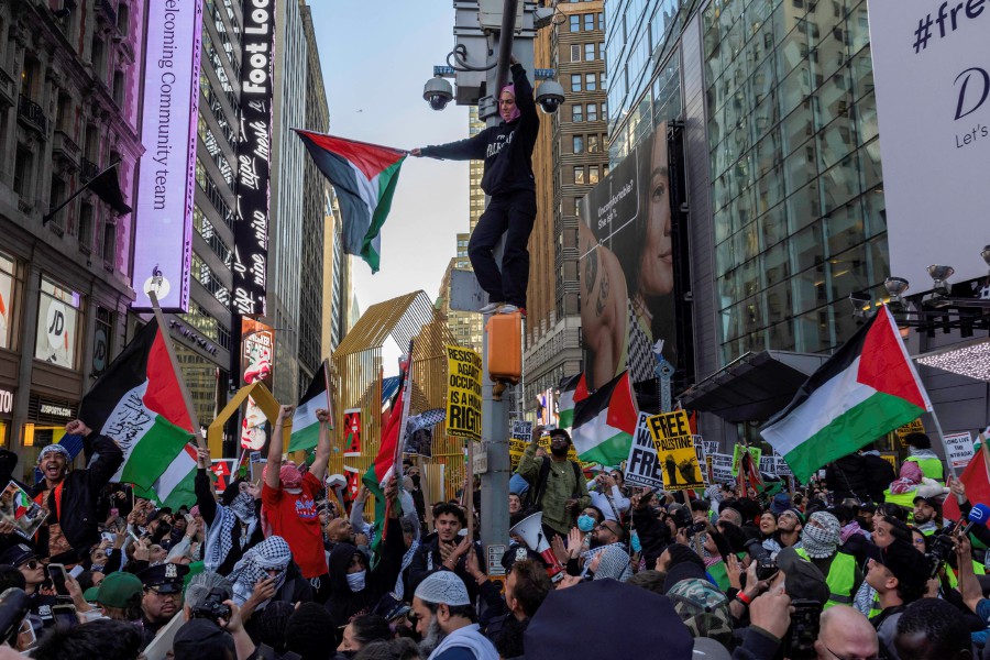 Pro-Palestine protestors march on October 13, 2023 in New York City. - AFP PIC