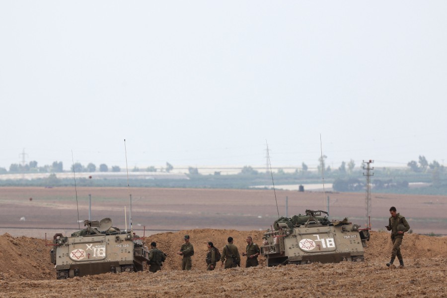 Israeli troop enforcements take position on the border with Gaza in southern Israel. - AFP PIC