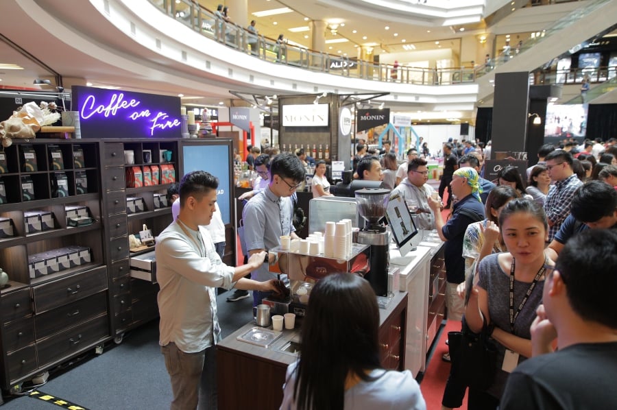 Crowd tantalised by the options available at the second Malaysia Coffee Fest at One Utama Shopping Centre.