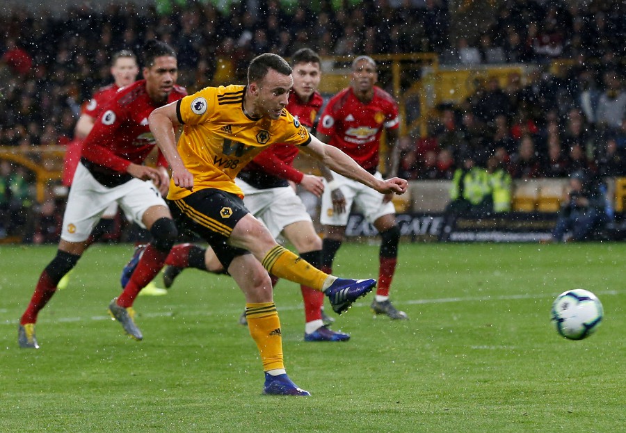  Wolverhampton Wanderers' Diogo Jota scores their first goal. - Reuters