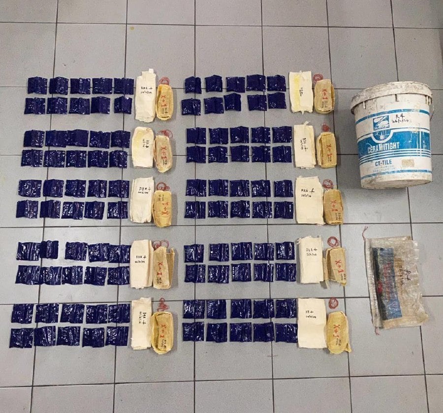 Police seized 20,000 methamphetamine pills worth nearly RM130,000 from the two women.- Courtesy pic (police)