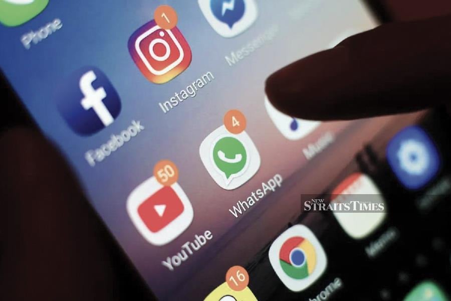 Without legal backing, it is left to the good faith of the social media platforms to agree to share the ad revenues. - NSTP file pic