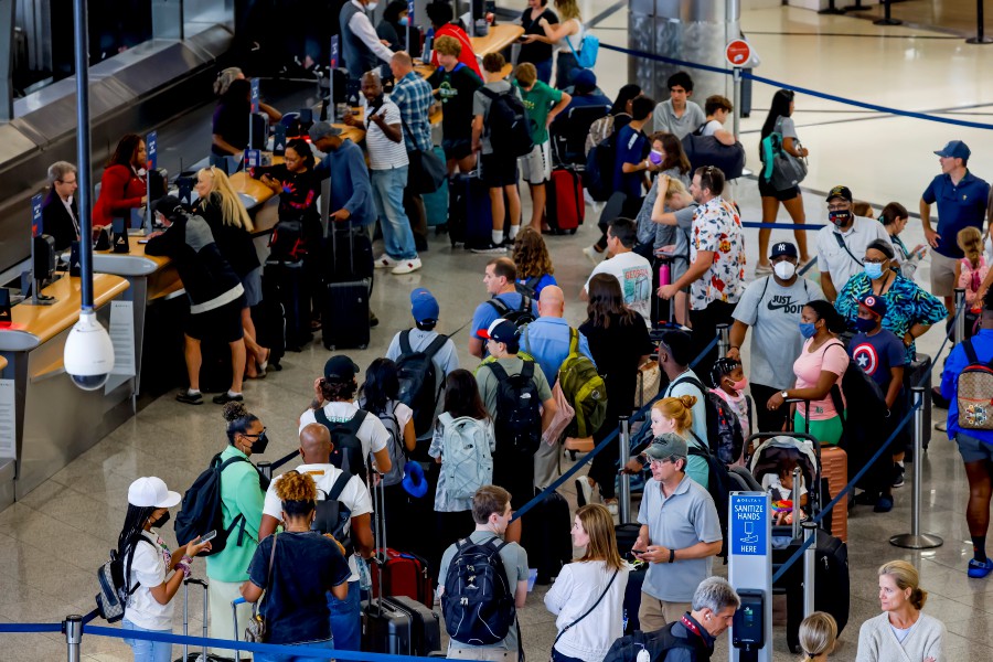  Air travelers check in for their Delta Air Lines flights in the domestic terminal during the busy summer holiday travel weekend at Hartsfield-Jackson Atlanta International Airport in Atlanta, Georgia, USA. -EPA PIC