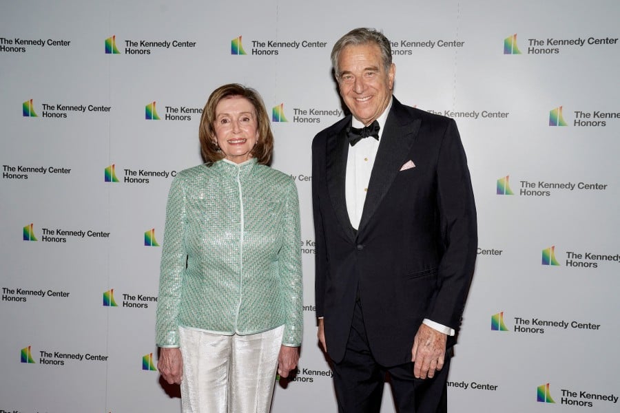 Speaker of the House Nancy Pelosi, and her husband Paul Pelosi arrive for the formal Artist's Dinner honuoring the recipients of the 44th Annual Kennedy Center Honors at the Library of Congress in Washington, D.C., U.S., December 4, 2021. - REUTERS PIC