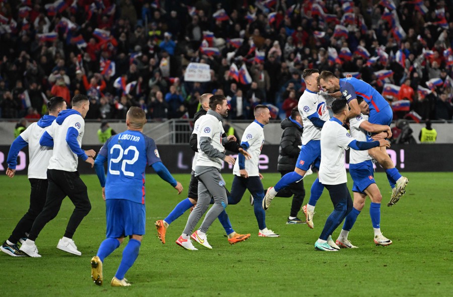 Slovakia's team celebrates after the Euro 2024 football tournament group J first round qualifying match between Slovakia and Iceland in Bratislava, Slovakia. - AFP PIC