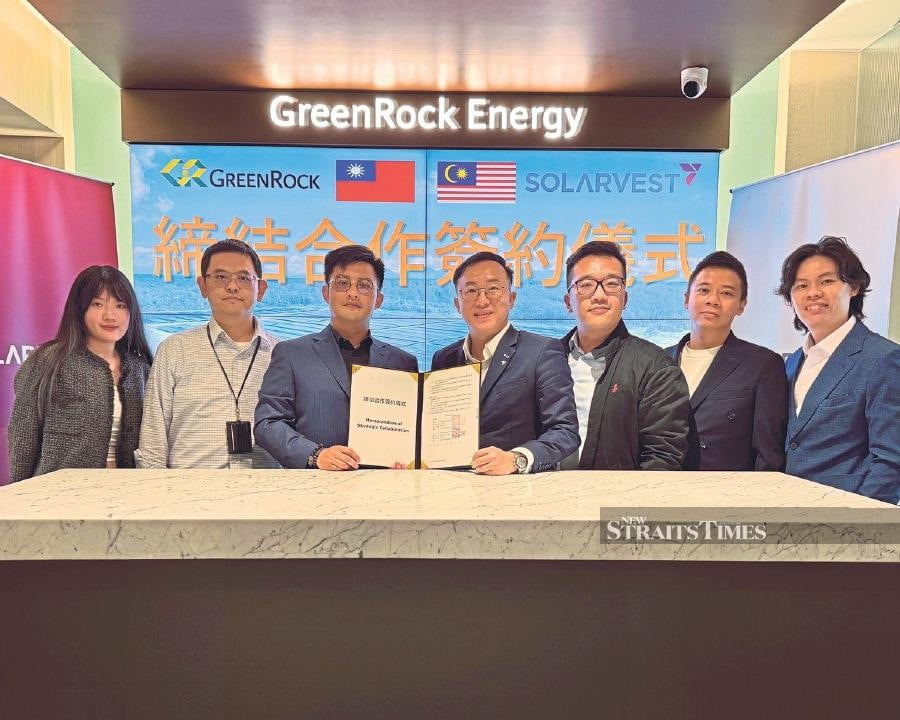 GreenRock Energy and Solarvest Holdings Bhd officials after the memorandum of strategic collaboration signing ceremony yesterday.