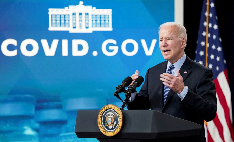 U.S. President Joe Biden delivers remarks on the Covid-19 before receiving a second Covid-19 booster vaccination in the Eisenhower Executive Office Building’s South Court Auditorium at the White House in Washington, U.S., March 30, 2022.  - REUTERS PIC