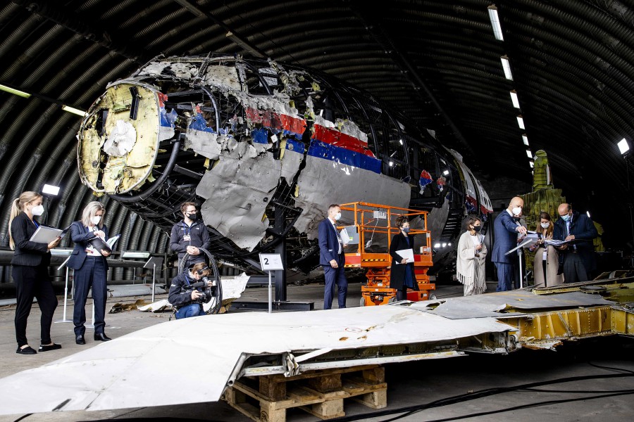 Members of the court view the reconstruction of the MH17 aircraft shot down in 2014 in Ukraine, at Gilze-Rijen air base, The Netherlands. -EPA pic