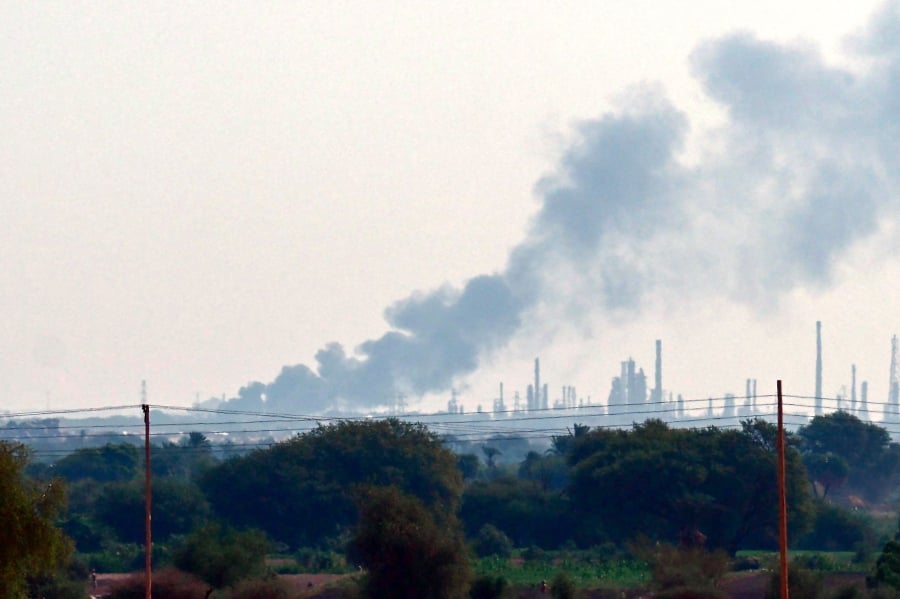 Smoke billows from al-Jaili oil refinery north of Omdurman, the Sudanese capital’s twin city, during battles between the Sudanese military forces and paramilitary Rapid Support Forces (RSF), on Wednesday. - AFP PIC