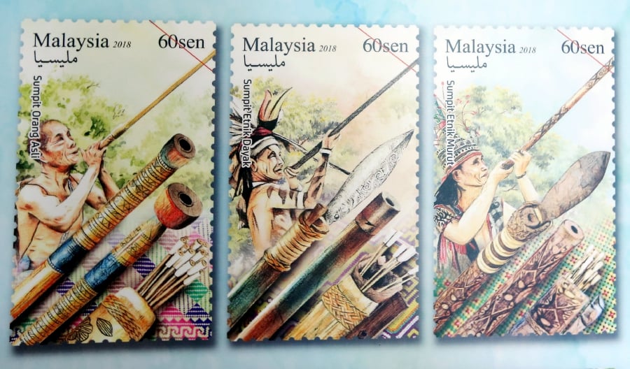The set consists of three RM0.60 stamp designs showcasing the “sumpit” (blowpipe) – Sumpit Orang Asli, Sumpit Etnik Dayak and Sumpit Etnik Murut. (NSTP/SALHANI IBRAHIM)