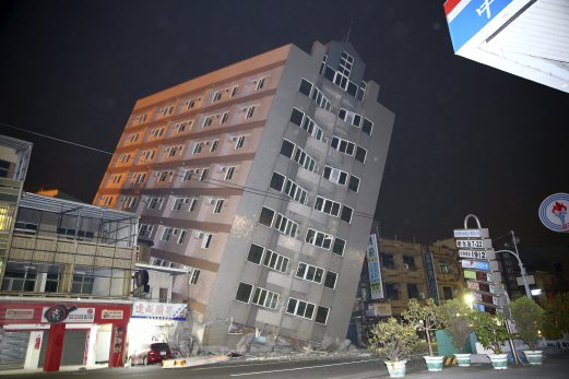 A building is damaged from an earthquake in Tainan. REUTERS