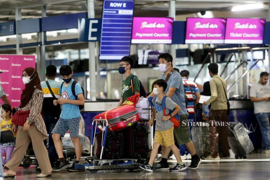 A general view of passengers at the Kuala Lumpur International Airport.  - NSTP file pic 