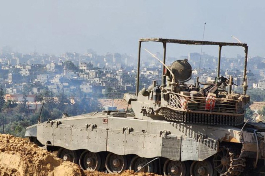  Soldiers on an armed vehicle during a military operation around at Al-Shifa hospital in Gaza City. - AFP PIC