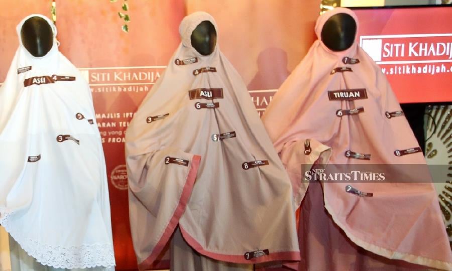 Siti Khadijah Apparel claims that the actions of Airaz Technologies which sells, advertises and distributes Telekung Suqainah Lite Airaz had violated its industrial design rights. - NSTP file pic, for illustration purposes only 
